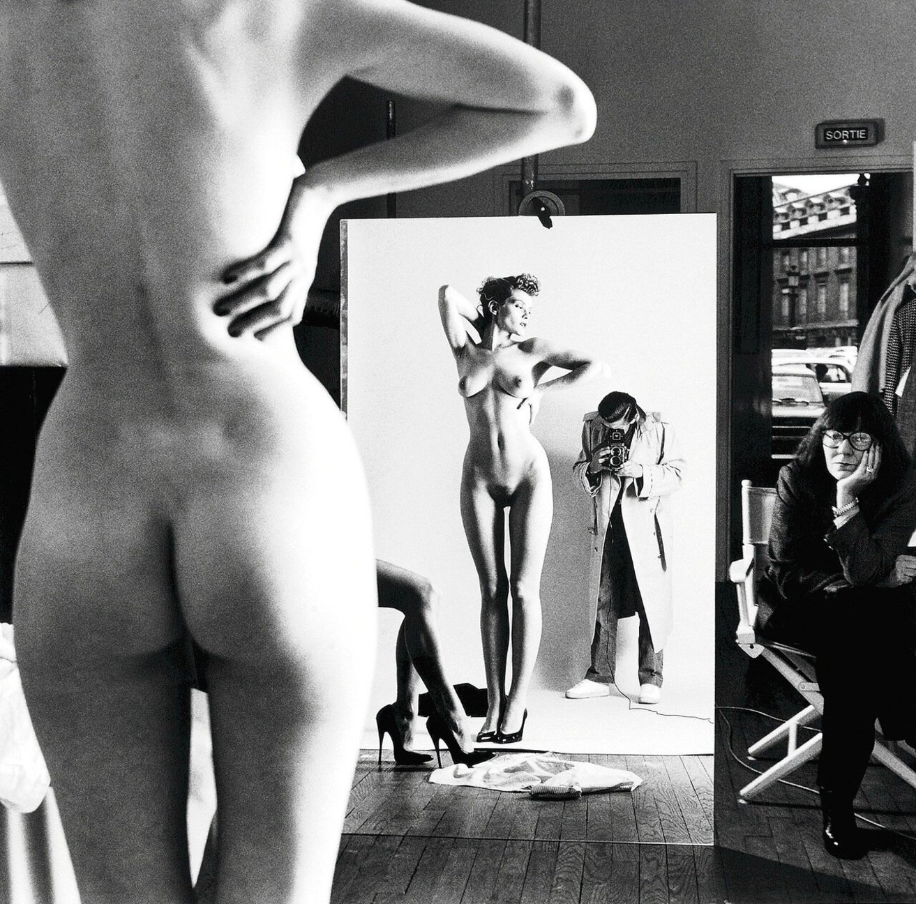 Artnet Self Portrait with Wife and Models, © Helmut Newton